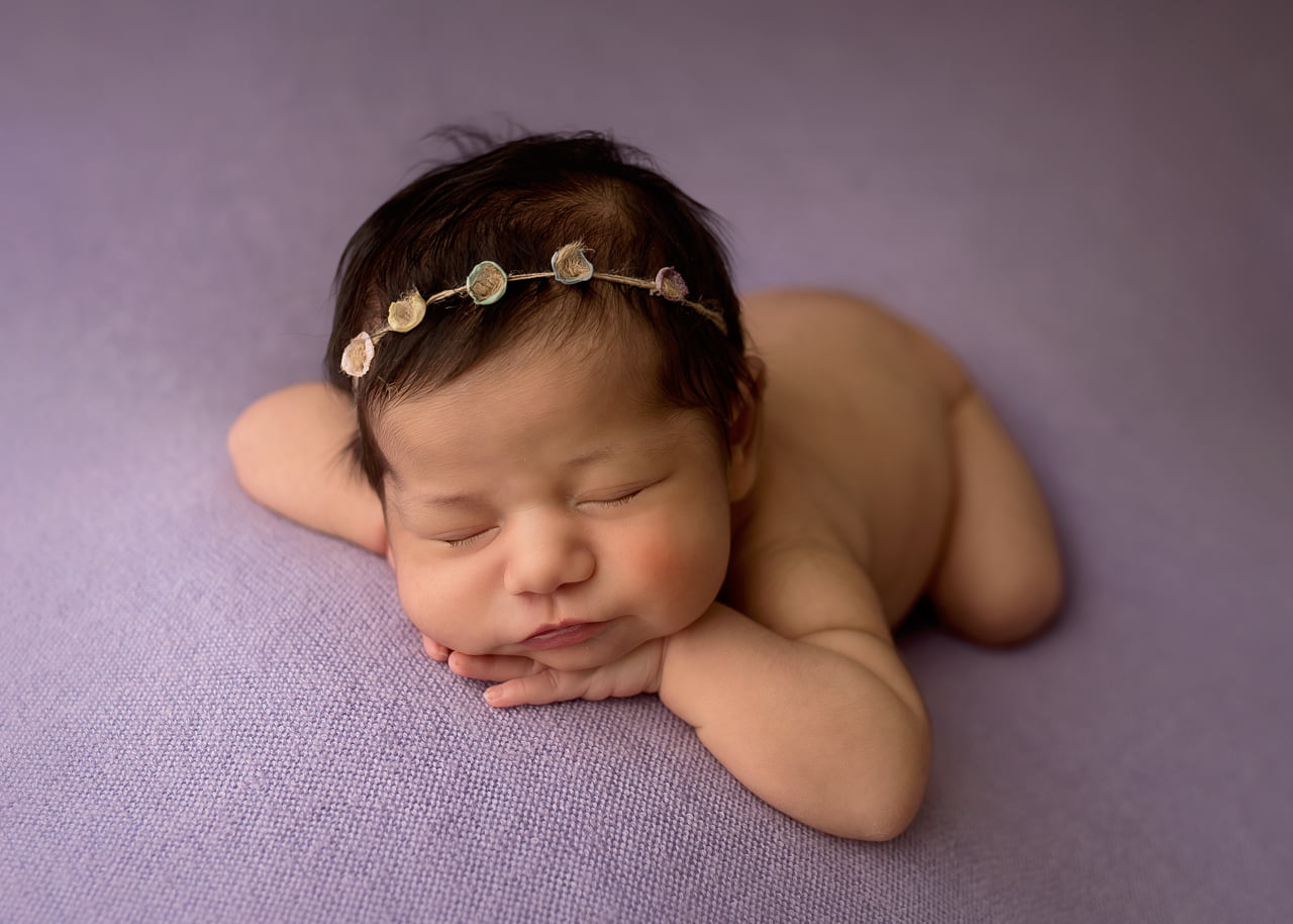 newborn in purple